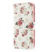 Plånboksfodral till Apple iPhone 6 / 6S (Blooming Flowers)