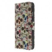Plånboksfodral till Apple iPhone 6 (Skull Heads)
